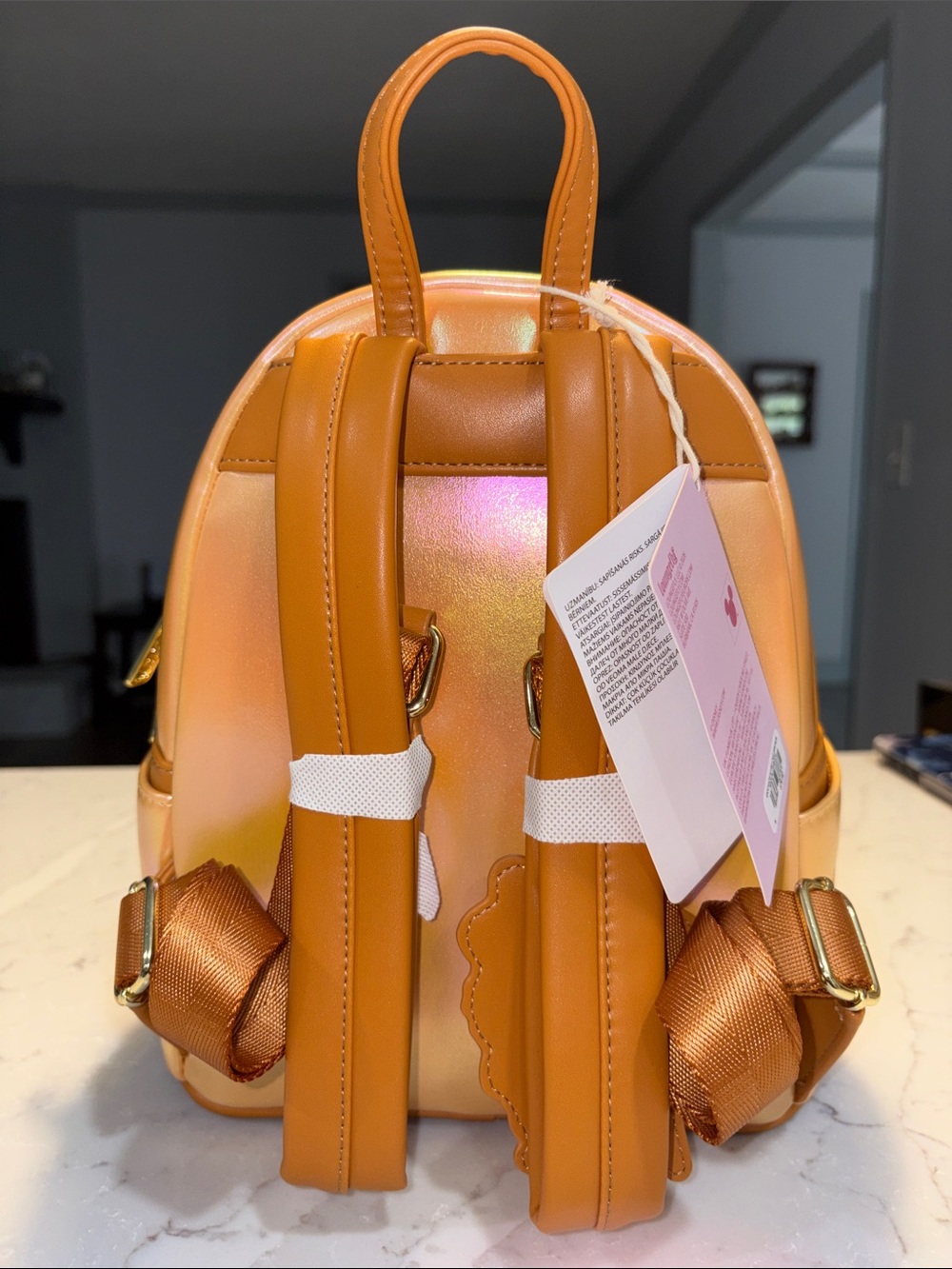 Loungefly Pocahontas Iridescent Orange Sunflower Cake Backpack - Picture 3 of 7